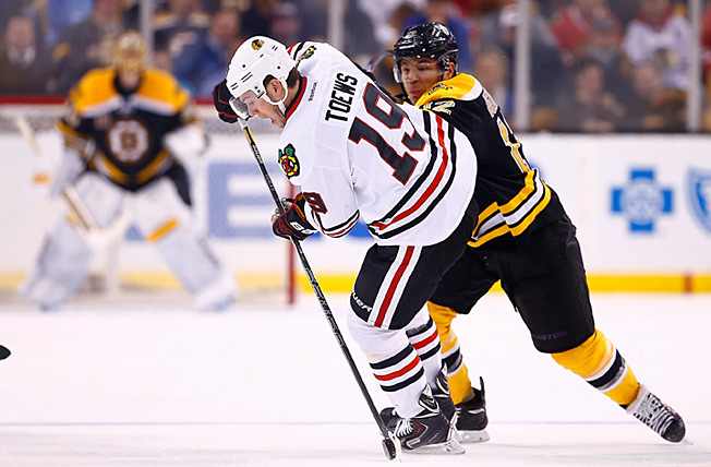 Jonathan Toews (19) and the Blackhawks defend their Cup, while Jarome Iginla (12) seeks his first.